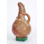 Cypriot polished redware jug with long stylized spout, bronze age, circa 2500-1450 BCE, 6"h