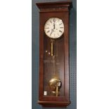 German Regulator Trend mahogany wall clock, having an Arabic numeral dial, above a pendulum and