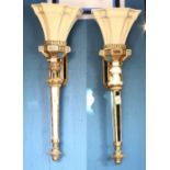 Pair of Venetian style mirrored wall sconces, each having a single light surmounting the mirrored