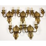 (lot of 5) Neoclassical style bronze wall mount sconces, 20th Century, each with two arms supporting