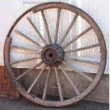 American Primitive style partial painted wooden wheel, having sixteen spokes centered with a wrought