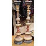 Pair of Spanish Revival candlesticks, early 20th Century, each with turned baluster and polychrome