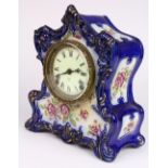 Ansonia porcelain mantle clock, having polychrome and partial gilt painted accents, with a porcelain