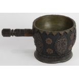 Himalayan wooden bowl with handle, decorated with brass repousse appliques, 5"h x 10.5"w