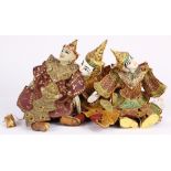 (lot of 3) Thai puppets, painted wood faces and clad in traditional attire with sequins and beads,