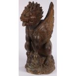 Indonesian wooden Garuda carving, the winged beast with tongue sticking outward, 20.5"h. Provenance: