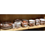 (lot of approx. 29) One shelf of Japanese Kutaniware: consisting of four plates; eight deep