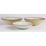 (lot of 3) Chinese ceramics, consisting of two Ding-type bowls, one with molded flowers to the