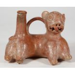 Pre-Columbian Peruvian possibly Lambayeque stirrup vessel, 400 - 600 CE, depicting a seated jaguar