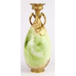 English Doulton Burslem Art Nouveau style bone china vase, having a baluster form flanked with