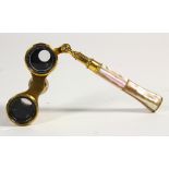 Lemaire French binocular opera glasses, early 20th Century, the brass elements inlaid with mother-