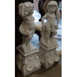 Pair of Classical style bacchanalian garden figural groups, each grasping grapes, and rising on a