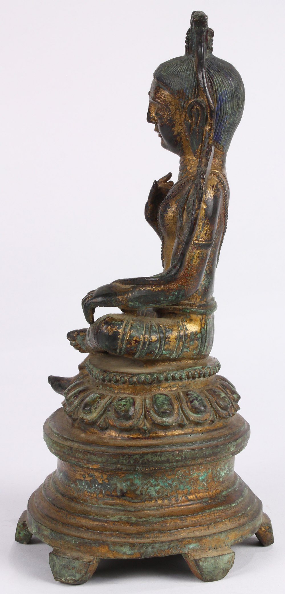 Chinese gilt bronze bodhisattva, seated in royal ease on a lotus pedestal, holding two lotus sprigs, - Image 2 of 4
