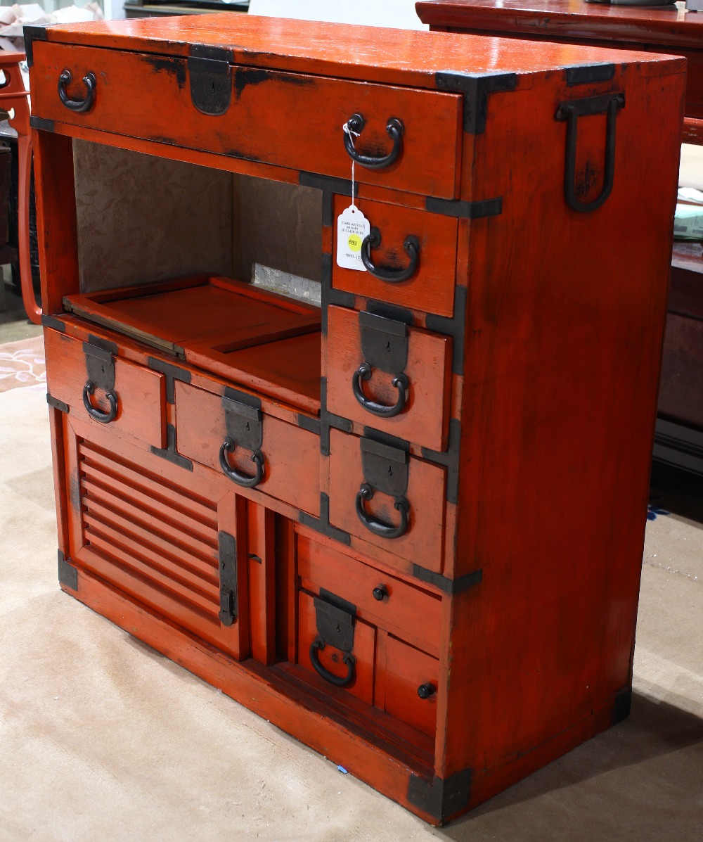 Japanese vermilion lacquered tansu, iron pole hangers on either end, a center drawer above three