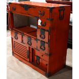 Japanese vermilion lacquered tansu, iron pole hangers on either end, a center drawer above three