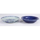 (lot of 2) Chinese ceramic plates: including one blue and white example with phoenix to the well