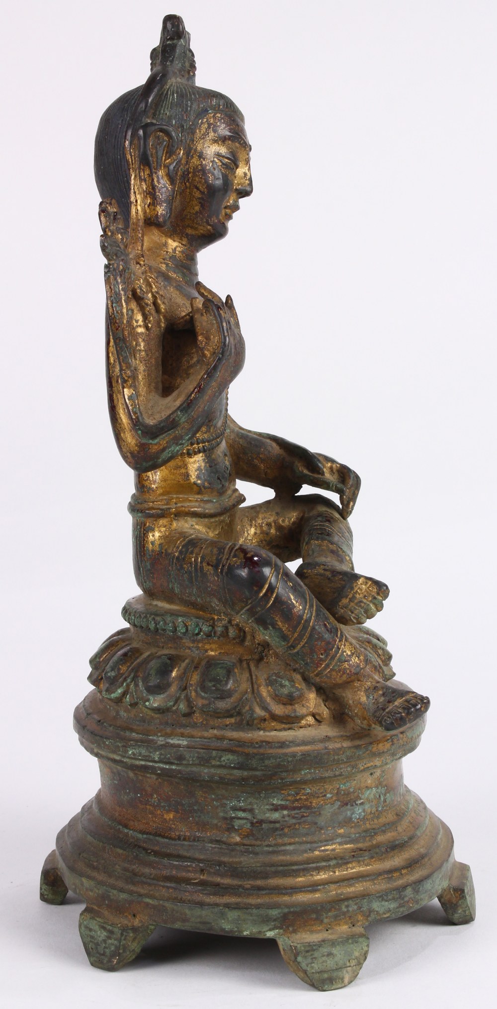 Chinese gilt bronze bodhisattva, seated in royal ease on a lotus pedestal, holding two lotus sprigs, - Image 4 of 4