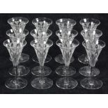 (Lot of 12) Egyptian Revival style stemmed cordial glasses, the conical vessels etched with