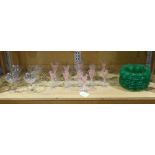 (lot of 27) Etched glass stemware and plates, in clear, green and pink glass, each with etched