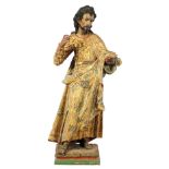 Large Continental carved and polychrome decorated Santos figure, 19th century, depicting a figure of