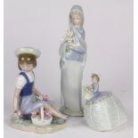 (lot of 3) Lladro porcelain figural statues, each depicting a young woman with bouquets of