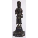 Chinese lacquered bronze Guanyin, with a benevolent face surmounted by an Amitabha seated diadem,