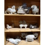 (lot of 9) Three shelves of Chinese hardstone items, consisting of four zoomorphic lidded