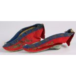 Pair of Chinese embroidered shoes for bound feet, the lotus slippers with a red satin silk ground