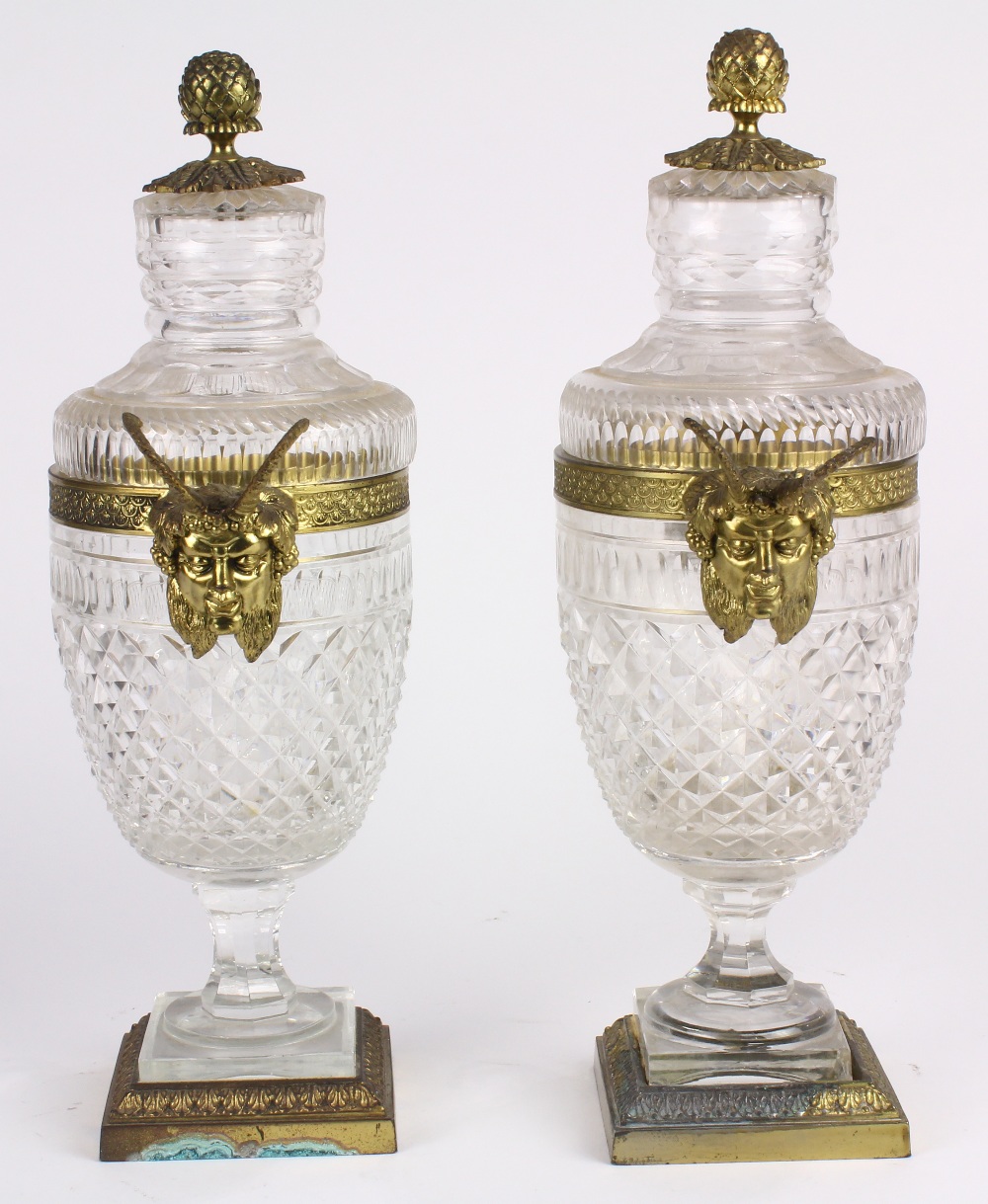 Pair of Neoclassical style cut glass and ormolu lidded urns, the baluster form flanked by mystical - Image 2 of 4