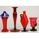 (Lot of 11) Czech art glass group, executed in red glass with black and blue glass accents,