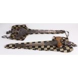 (lot of 2) Indonesian kris daggers, each with a curvilinear blade, and sheaths with repousse