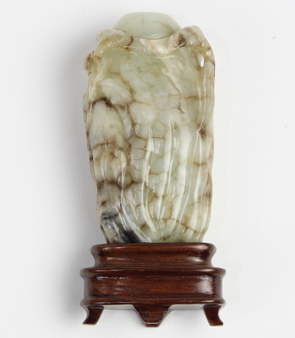 Chinese jade snuff bottle, of melon form accented by leafy tendrils carved in relief, the white-gray - Image 2 of 5