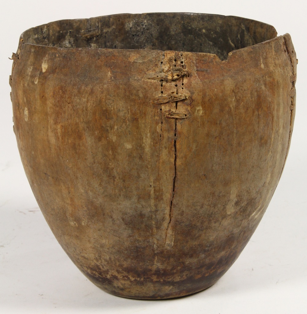 Oceanic bowl with old indigenous repair, of a light-weight wood, gourd or nut shell, probably