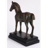 Patinated bronze figural sculpture of a horse, executed in the Asian taste, depicted standing