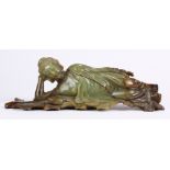 Chinese jade sculpture of Parinirvana Buddha, in a reclining pose with head resting on the right