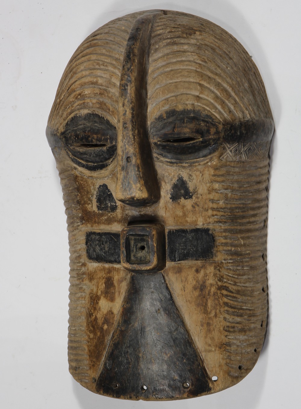 Kifwebe Society, Luba, D.R. Congo, mask, executed in black against yellowed white, somewhat small