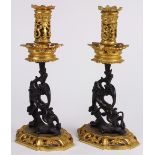 Pair of Renaissance Revival bronze figural griffin form candleholders, 19th century, having