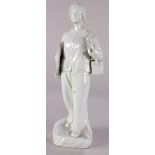 Chinese blanc de chine porcelain figure, of a women carrying a doctor's bag and a hat, the base