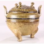 Chinese celadon glazed lidded censer, the domed lid with three recumbent zoomorphs, the vessel