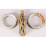 (lot of 3) Chinese hardstone bangles and belt hook, consisting of of two gray-green bangles with