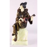 Art Deco onyx and bronze figural statue, depicting a courtly musician seated on a tiered stone