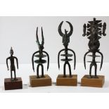 (lot of 4) Dogon and Bamana style, Mali patinated bronze figural dance sculptures, each rising on