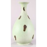 Chinese bottle vase, in the form of a yuhuchung ping, with red splashes on a celadon ground, 10.25"