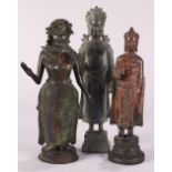 (lot of 3) Southeast Asian metal sculptures, two in abhaya mudra and standing on a pedestal; the