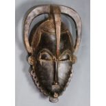Yaure, Cote d'Ivoire, mask with tripartite coiffure curving down in three places, all finely