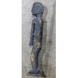 Atauro Island style carved standing male figure, 25"h