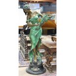 Patinated bronze figural sculpture, the life size form depicting a beauty, her shoulders exposed,