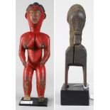 (lot of 2) Guro, Ivory Coast, red painted standing female figure with styled hair and naturalistic