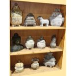 (lot of 11) Three shelves of Chinese archaistic hardstone decorative vessels and animal carving,