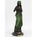 Patinated bronze figural sculpture after A. Carier Belleuse, titled "Girl Reading Bible" depicting a